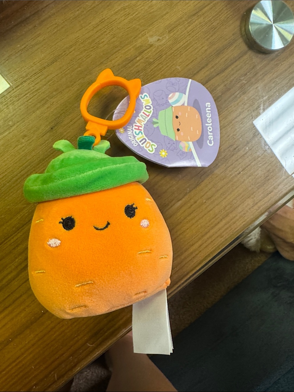Carolee Orange Plush Clip-On with Green Hat